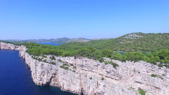 Aerial view of Dalmatian shore with cliffs and the famous salty lake