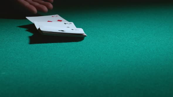 Throwing cards on table in slow motion; shot on Phantom Flex 4K at 1000 fps alt