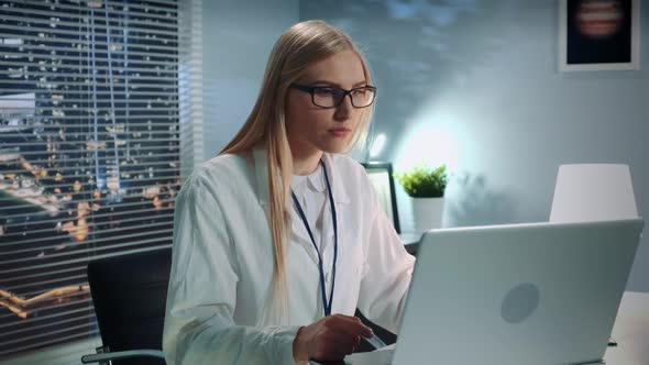 Middle Close-up of Professional Psychologist Making Therapy Session Online By Video Call on Computer