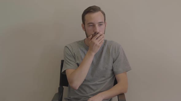 Young Thoughtful Man Finally Found an Interesting Idea and Bulb Appearing in Front of Him Start