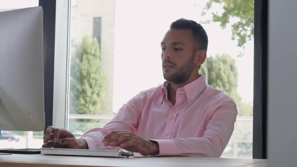 Businessman Surfing Internet on PC