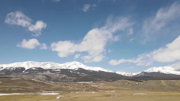 4k drone video time lapse of clouds over Rocky Mountains in Colorado.
