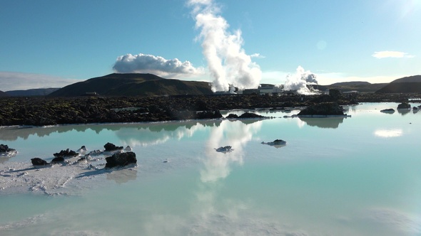 Environment. Iceland. Geyser in famous tourist attraction. Steam from fumarole in geothermal area.