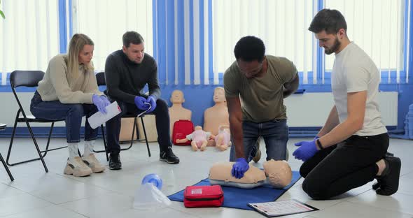 Group of People CPR First Aid Training Course