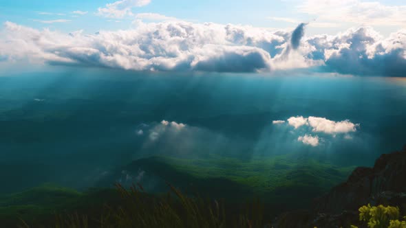 Clouds Float Over the Green Mountains Covered By Forest
