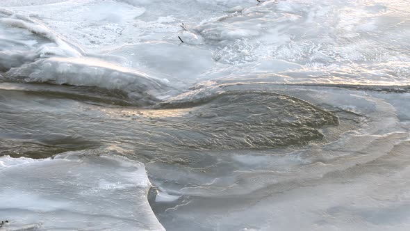 Stream Water Supply Out of the Frozen Ice Crack