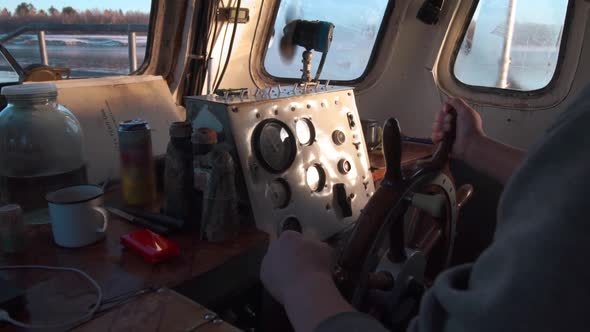 View Inside of Pilothouse with Windows Compass Steering Wheel and Dashboard