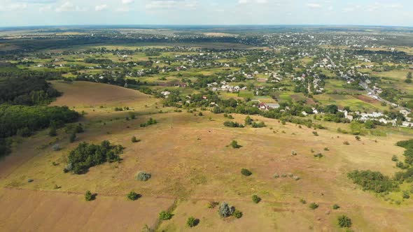 Aerial View of Green Fields and Hills on the Countryside, Green Valley, Village Skyline