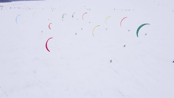 SnowKiting Kitesurfing Sport on the Ice Lake Winter