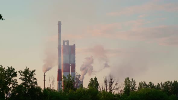 Factory chimneys pollution black thick smoke sky.  Air pollution and global warming climate change