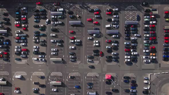 Parked cars on parking lot near shopping mall