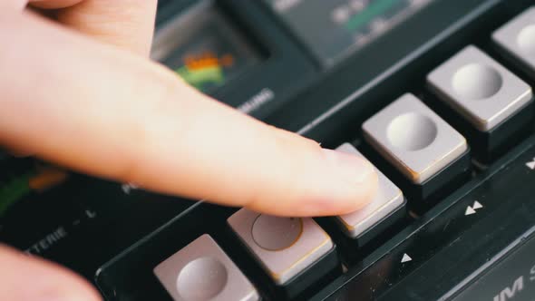 Pushing Play Button on a Vintage Tape Recorder. Transistor Retro Radio