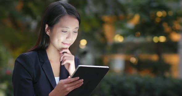 Businesswoman use of digital tablet computer