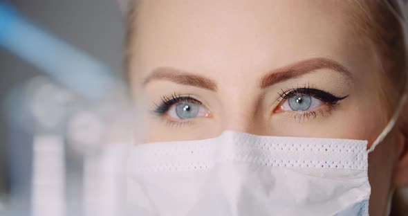 Working in Lab - Scientist Analyzing Liquid in Laboratory alt