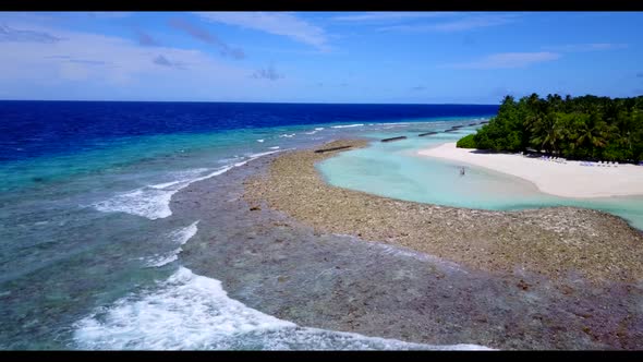 Aerial tourism of paradise bay beach break by turquoise ocean and white sandy background of a daytri