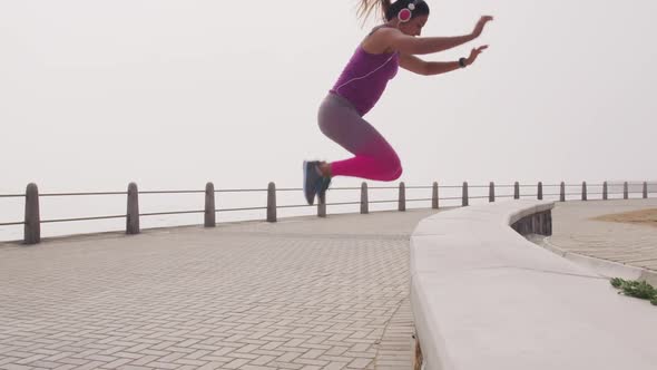 Caucasian woman working out on the docks