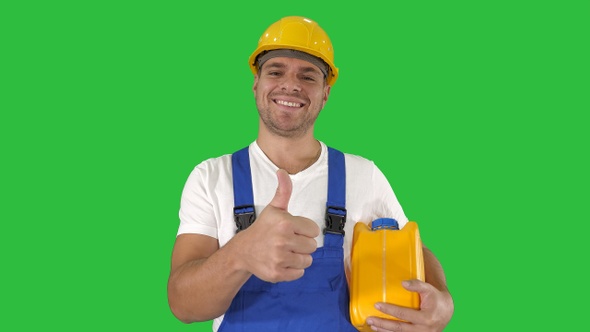 A real worker giving a thumbs up holding canister and smiling