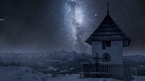 Timelapse of milky way and snowy Tatra mountains, Poland