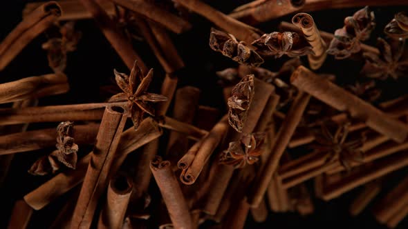 Super Slow Motion Shot of Cinnamon and Star Anise Explosion on Black Background at 1000Fps