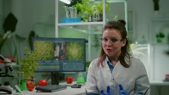 Pov of Chemist Woman in White Coat Analyzing with Biologists Team