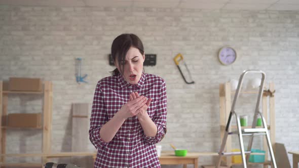 Young Woman Injured Her Finger with a Hammer