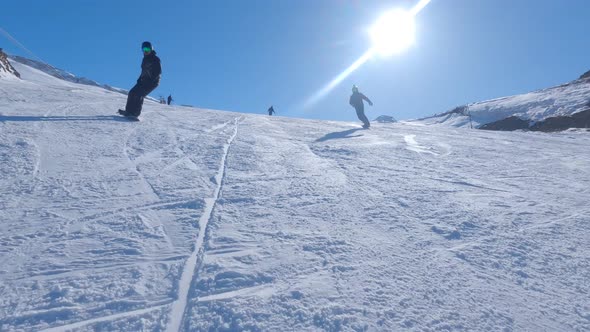 Two Snowboarders