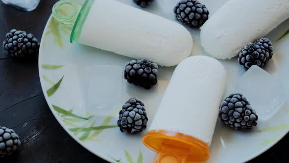 Top view of Homemade  ice cream with with blackberry on the plate