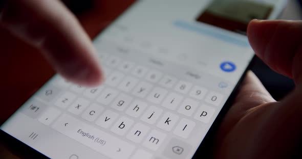 Close Up Shot of Hands Type or Write Messages From a Smartphone