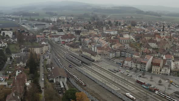Aerial View of the Railway Station in the City of Payerne in Switzerland alt