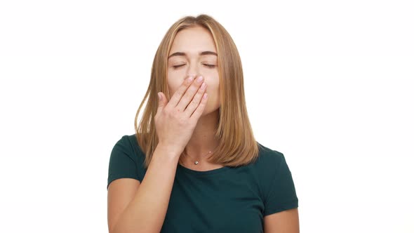 Portrait of Beautiful Female 20s Blowing Air Kiss on Camera Being Flirty and Candid Expressing Her