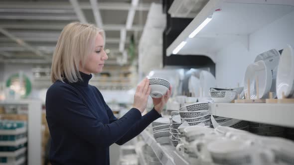 Young Woman in a Kitchenware Shop