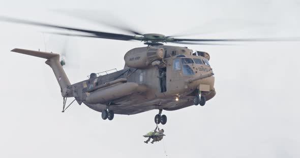 Large helicopter during a military rescue mission