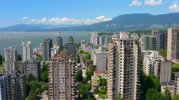 Stanley Park Revealed Behind High-rise Condominium Buildings In West End Peninsula At The Coast Of B