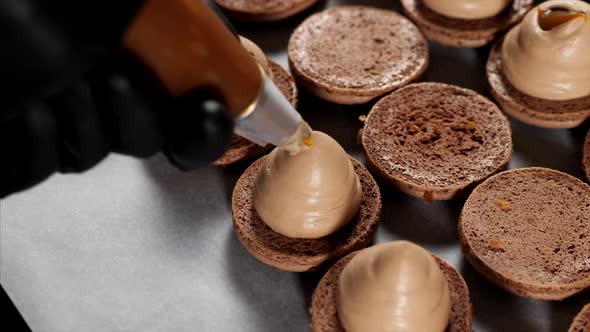 Chef Is Making Caramel Macarons Closeup