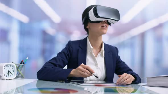 Creative Graphic Designer in Vr Goggles Drawing Tablet in Office, Modern Device