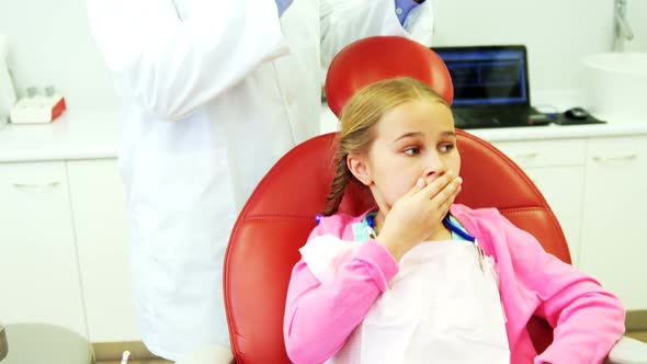 Young patient scared during a dental check-up