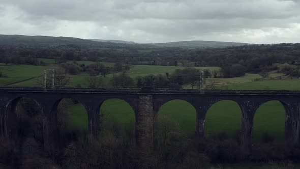 An aerial view of the a large Buxton railway bridge viaduct in the Derbyshire Peak District national