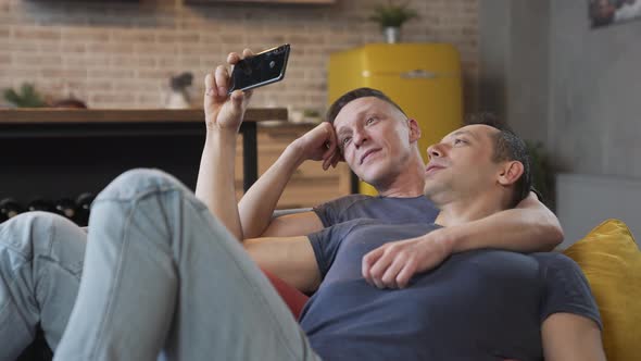 Male Gay Couple Spend Time at Home