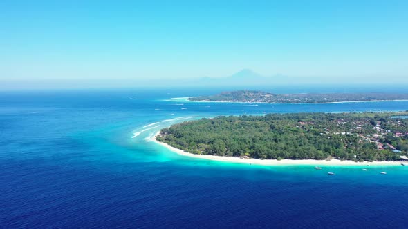 Aerial top view tourism of idyllic lagoon beach holiday by blue ocean with white sand background of 