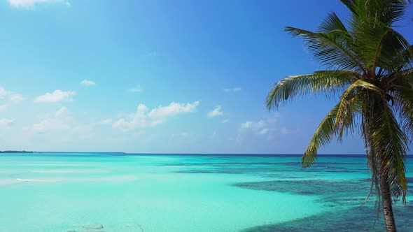 Beautiful fly over copy space shot of a summer white paradise sand beach and aqua turquoise water ba