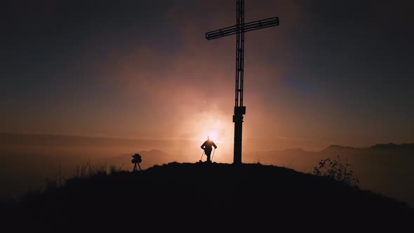 Man With Happy Dog Arrive On Top Of A Mountain