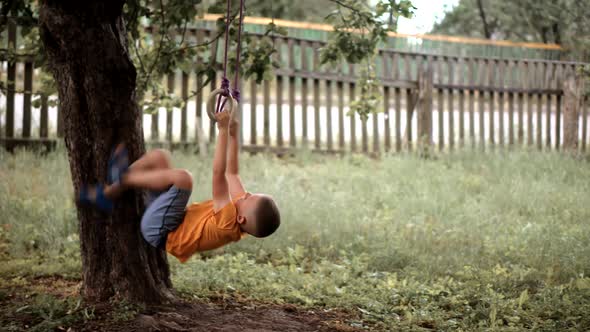 Children Playing Family Parent Holidays Relationship With Kid Swing Ride. Son Boy Play Happiness.