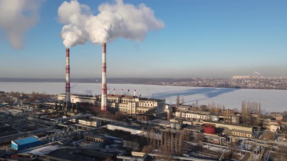 Industrial Factory pipes emission carbon smoke and gases, aerial view