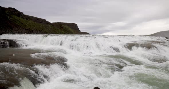 Guffoss Falls in Iceland gimbal video panning right in slow motion.