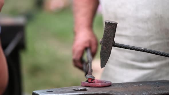 Closeup of Forging a Horseshoe