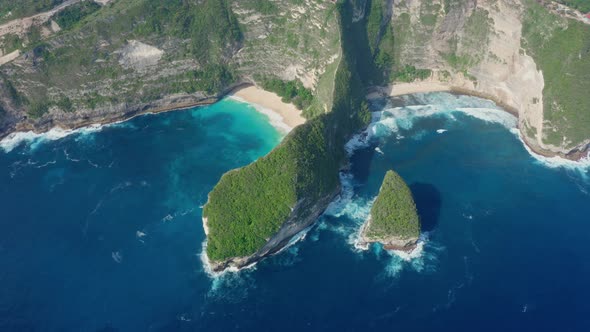 Aerial View of Kelingking Beach in Nusa Penida Island Beautiful Ocean Mountains