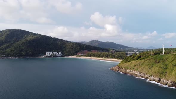 Aerial Flyover of Tropical Coastline and Beach in Asia