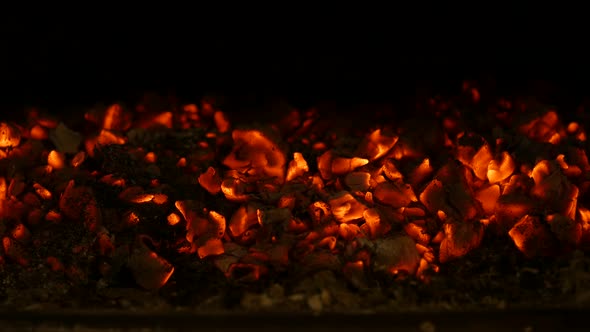 Smoldering Charcoal in a Fireplace