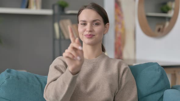 Portrait of Woman Shaking Head As No Sign