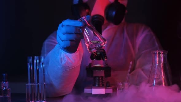 Liquid nitrogen floats on equipment table. laboratory experiments with cryogen